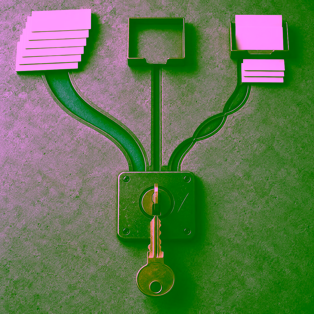 A brass key held against a lock plate whose keyhole is already filled by another key, with three inlaid channels leading away from it: a wide cyan-lined channel to an intact stack of blank record cards, a narrow channel to an empty tray, and a braided channel to a tray holding only part of a stack