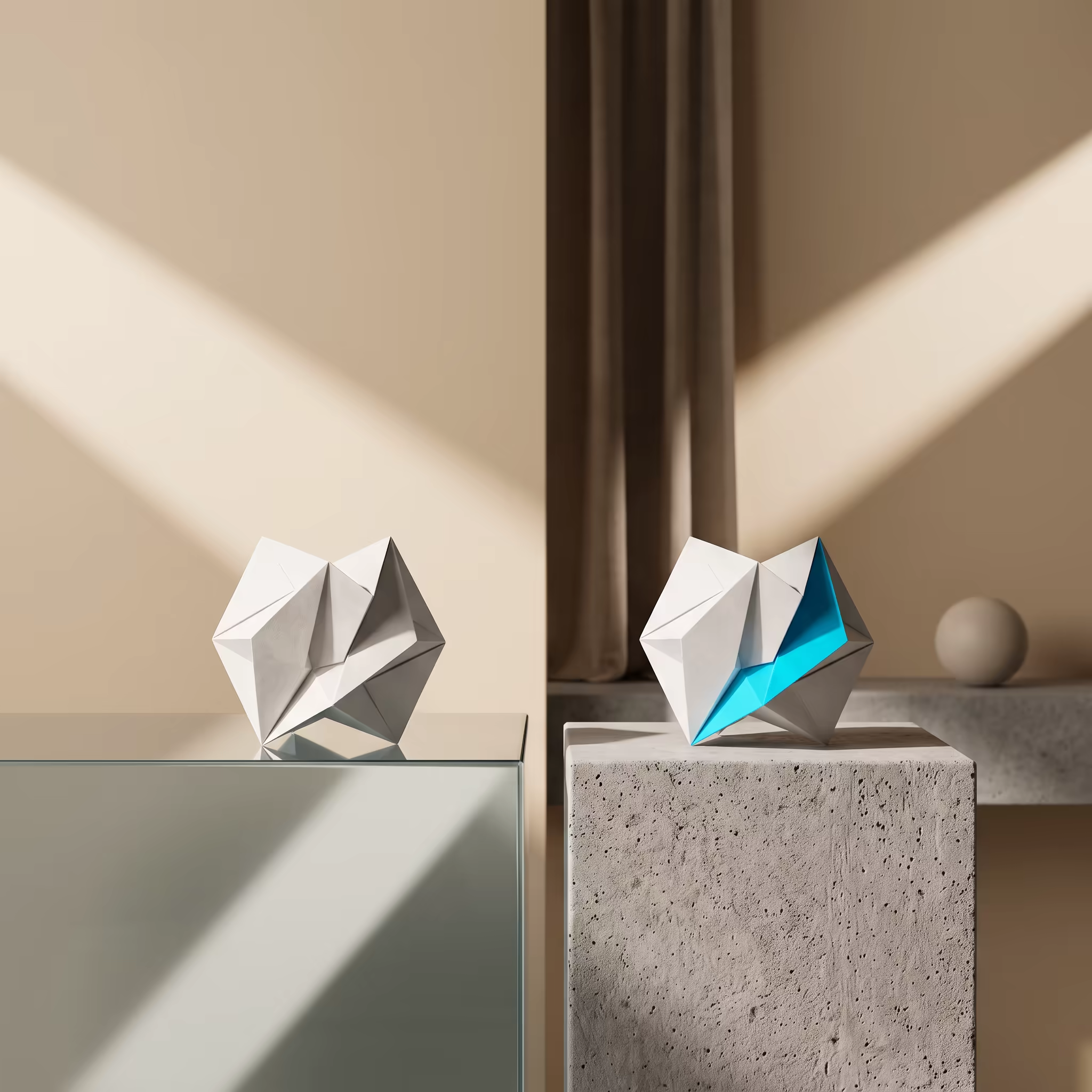 Two identical white geometric paper sculptures sit on separate plinths, one glass and one concrete, the right sculpture split by a bright cyan facet